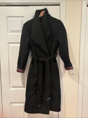 Ricki’s Black Long Belted Wrap Coat with Printed Cuff Detail